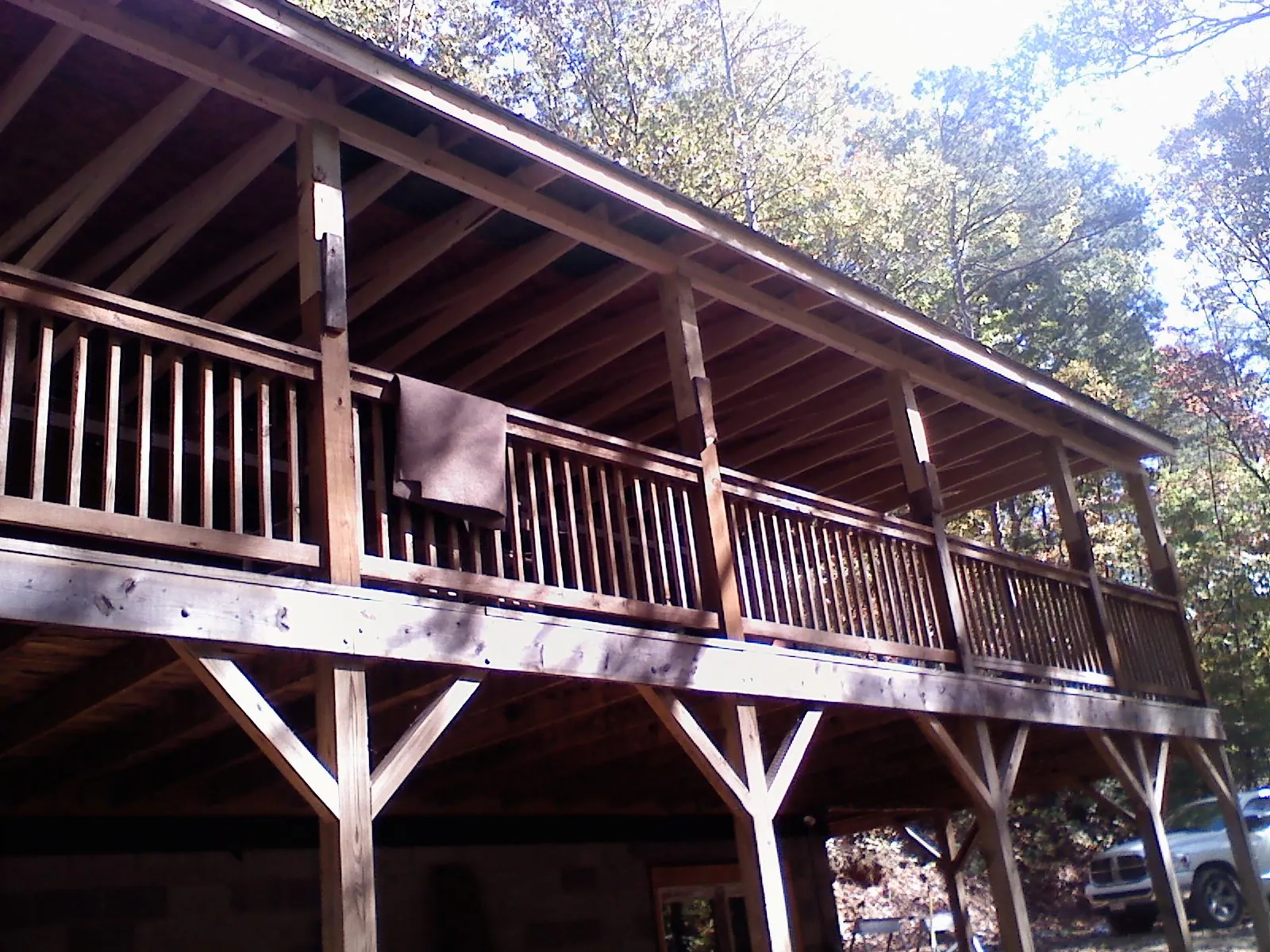 Timber framing under a new elevated porch and deck — Roof Leak Repair in Sabattus by Roofing Brothers